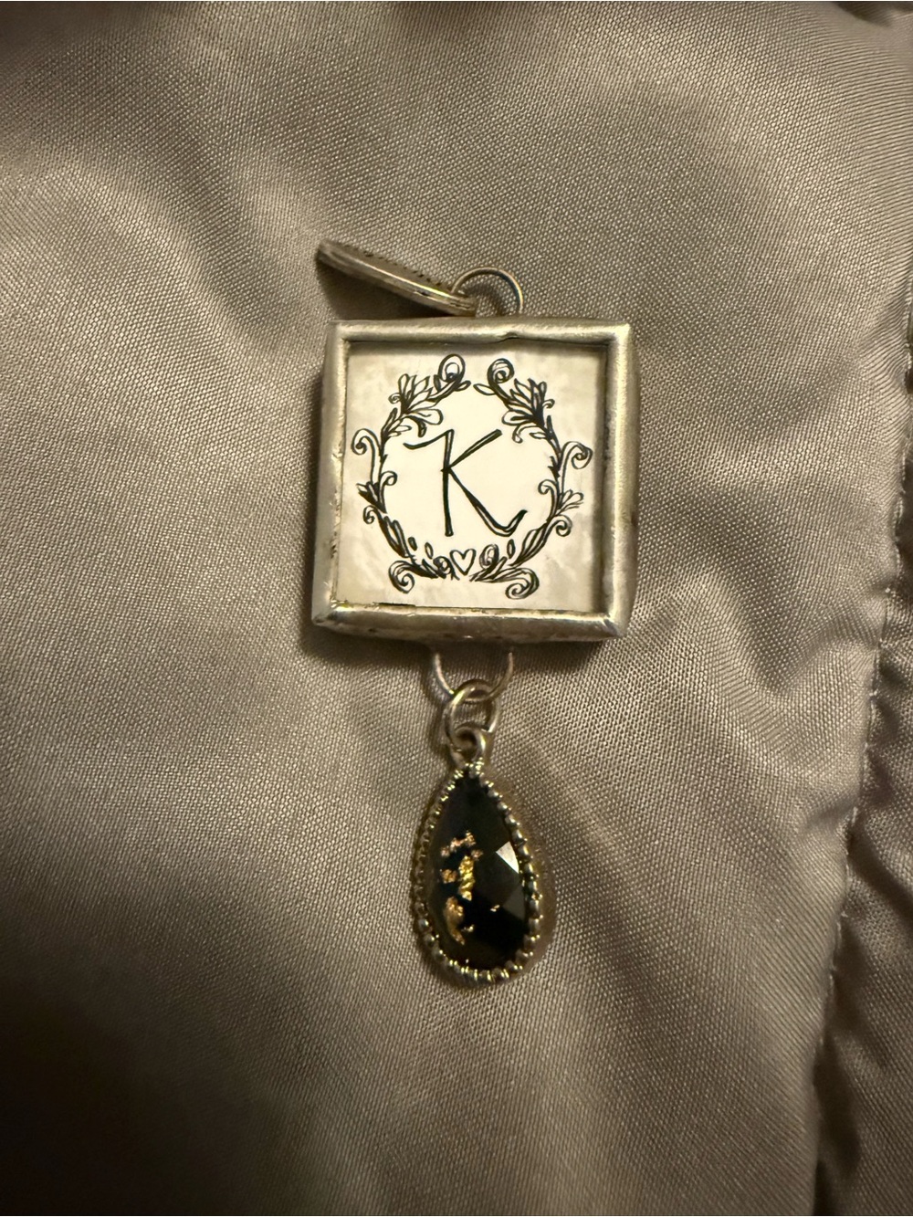 Plunder pendant - double sided K and birds